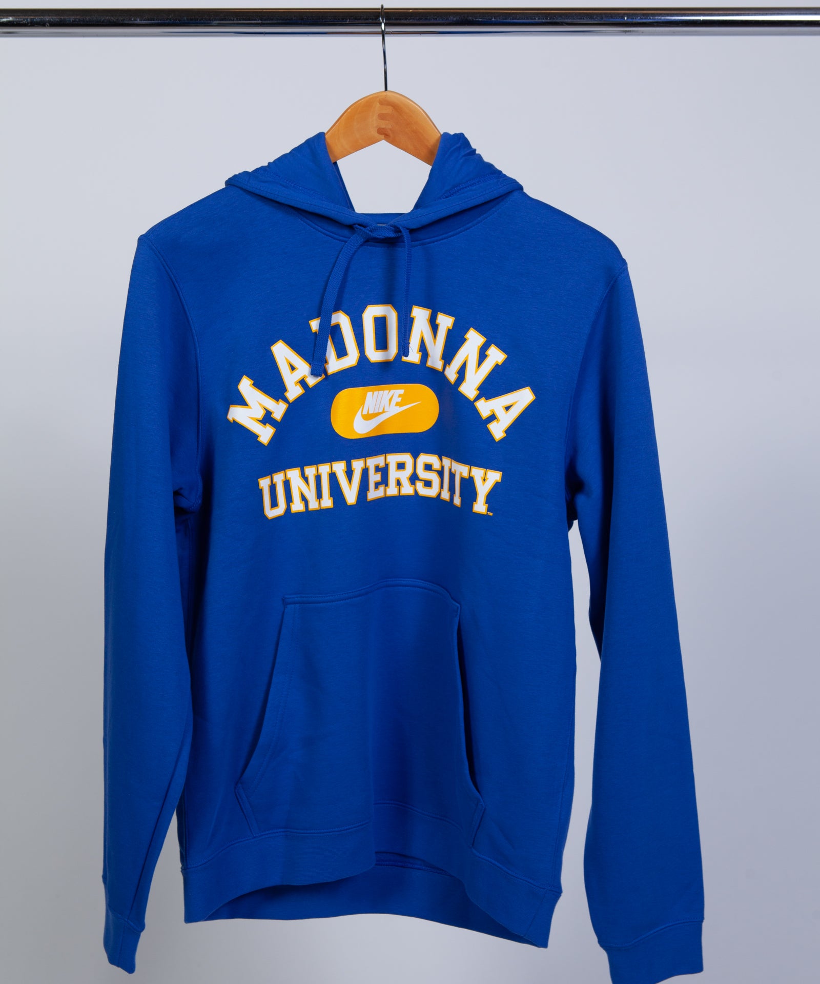 Blue hoodie with 'Madonna University' text on a hanger against a white background