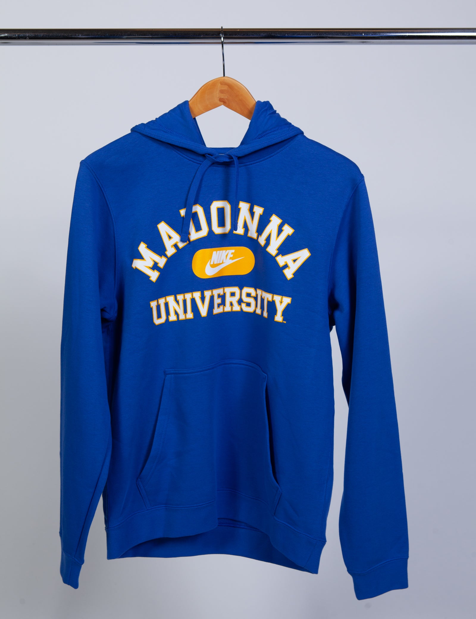 Blue hoodie with 'Madonna University' text on a hanger against a white background